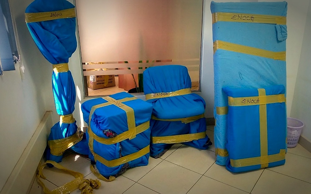 Magic Movers padded blanket wrapping and item inventory labeling